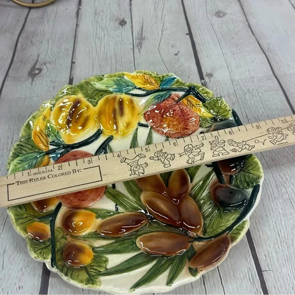 Vintage plate made in italy with olives figs Sicilian blood orange Quince fig